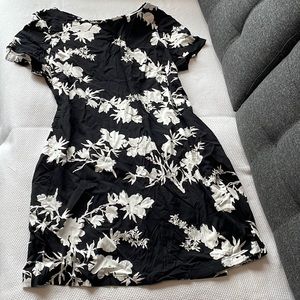 Black and white mid length dress. No brand tag. Size 14 or L appropriate